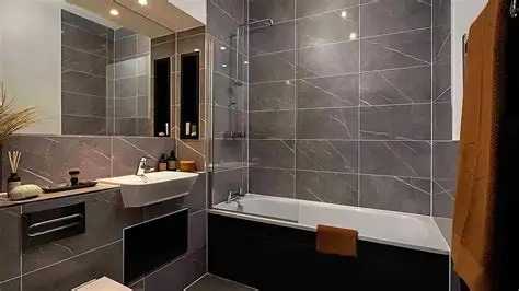 Worker installing ceramic tiles on a Dubai home floor